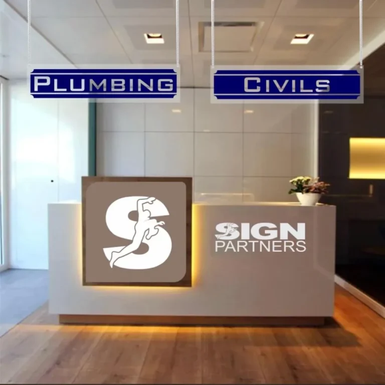 Reception desk logo and hanging department signs by Signpartners