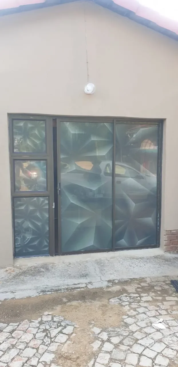 Patterned window film applied to sliding doors by Signpartners